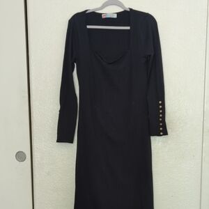 Elegant Black Dress with Gold Button Accents